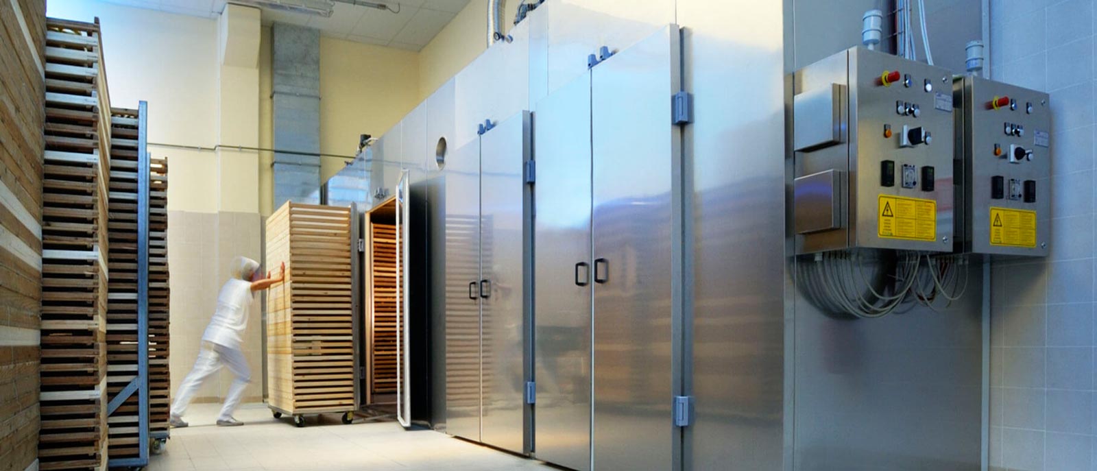 Industrial cold storage room with insulated doors and refrigeration equipment